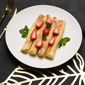 Cheese and strawberry crepes