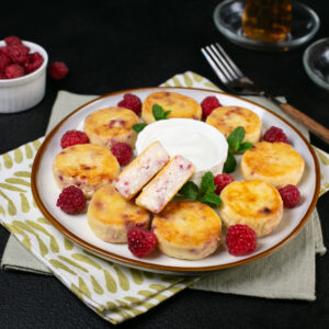 Baby Syrnyky with Quail Eggs and Raspberry