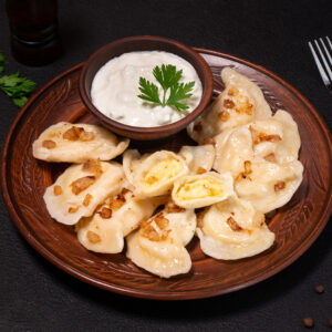 Potato varenyky with bacon crisps (Pierogi)